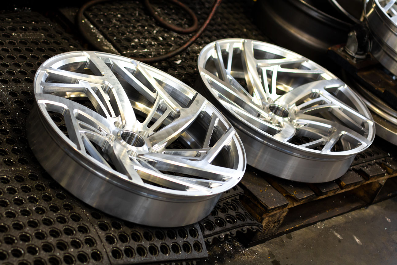 Pair of finished raw-machined forged wheels
